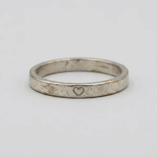 Plated Charm From A Shelf